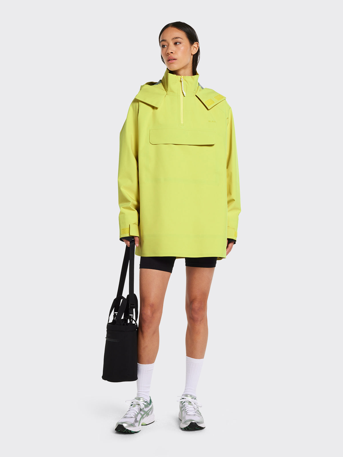 Voss poncho in the color Muted Lime from Blæst
