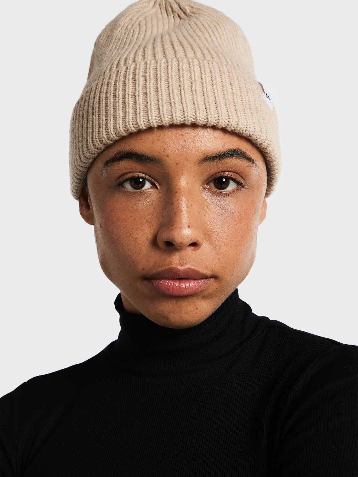 Woman in Beanie from Blæst in Beige
