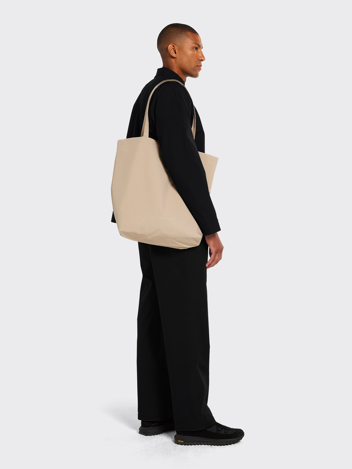 Man with Moa tote bag by Blæst