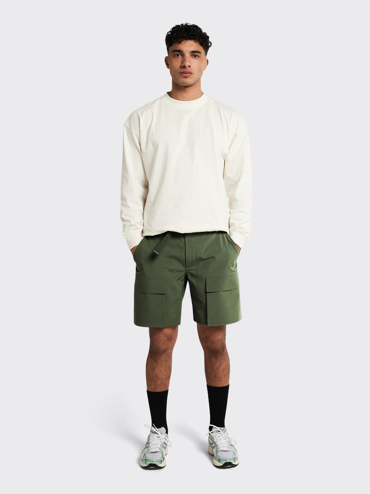 Man wearing Giske shorts by Blæst in Dusty Green