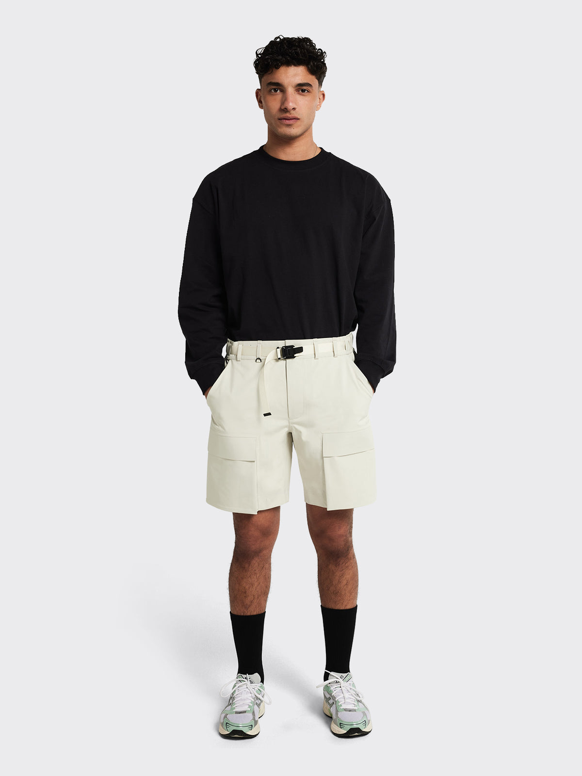 Man wearing Giske shorts by Blæst in the color Birch