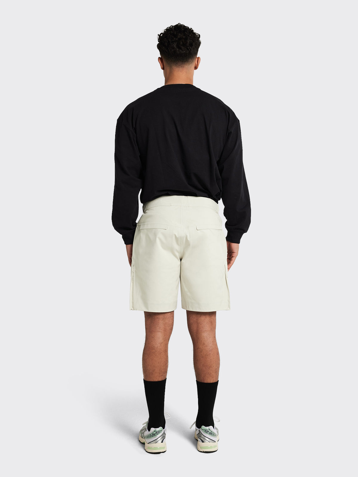 Man wearing Giske shorts by Blæst in the color Birch
