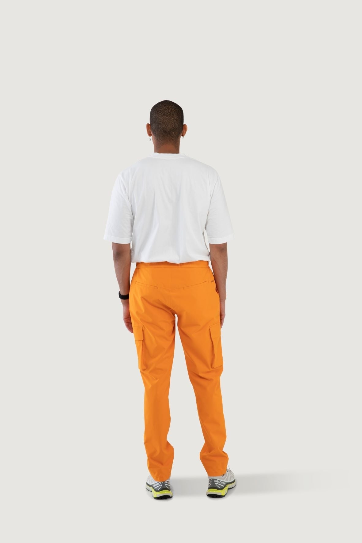 Model wearing Giske pant from Blæst in Orange