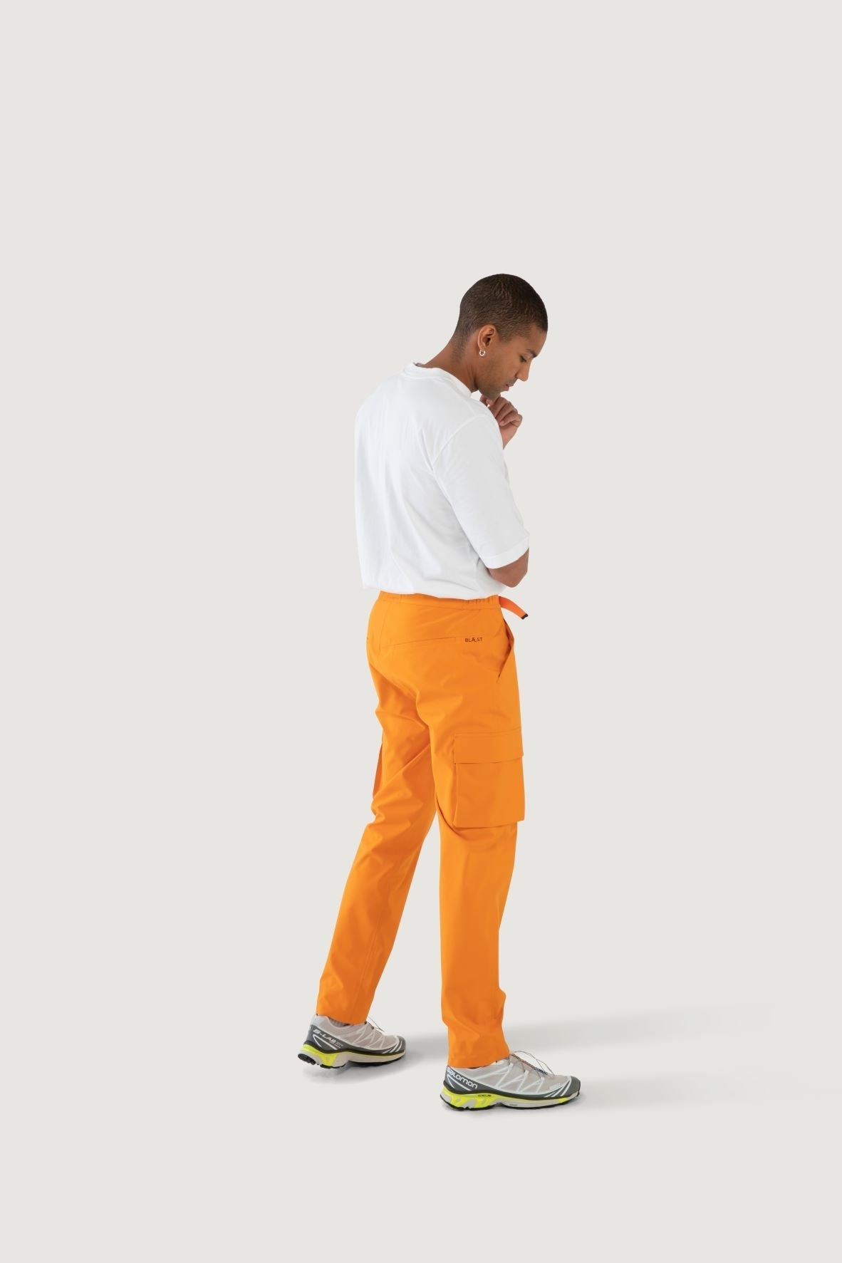 Model wearing Giske pant from Blæst in Orange